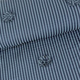 Raya seersucker y Flores cosidas.